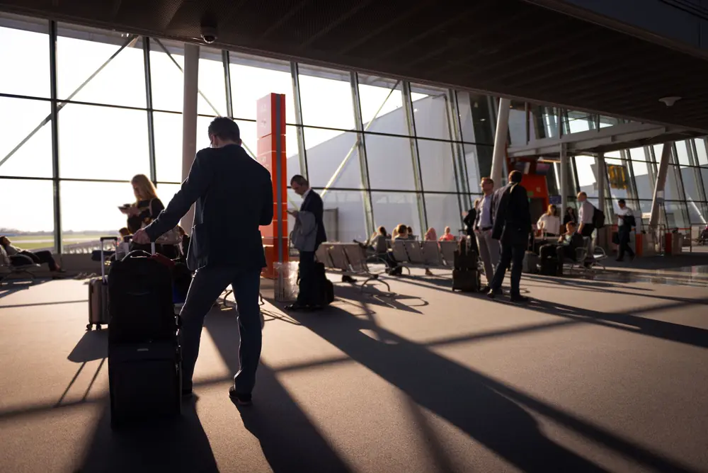 A traveller waiting in an airport terminal