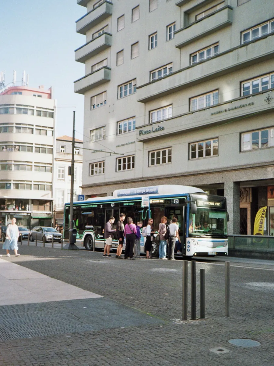 A city bus at a stop on a European street