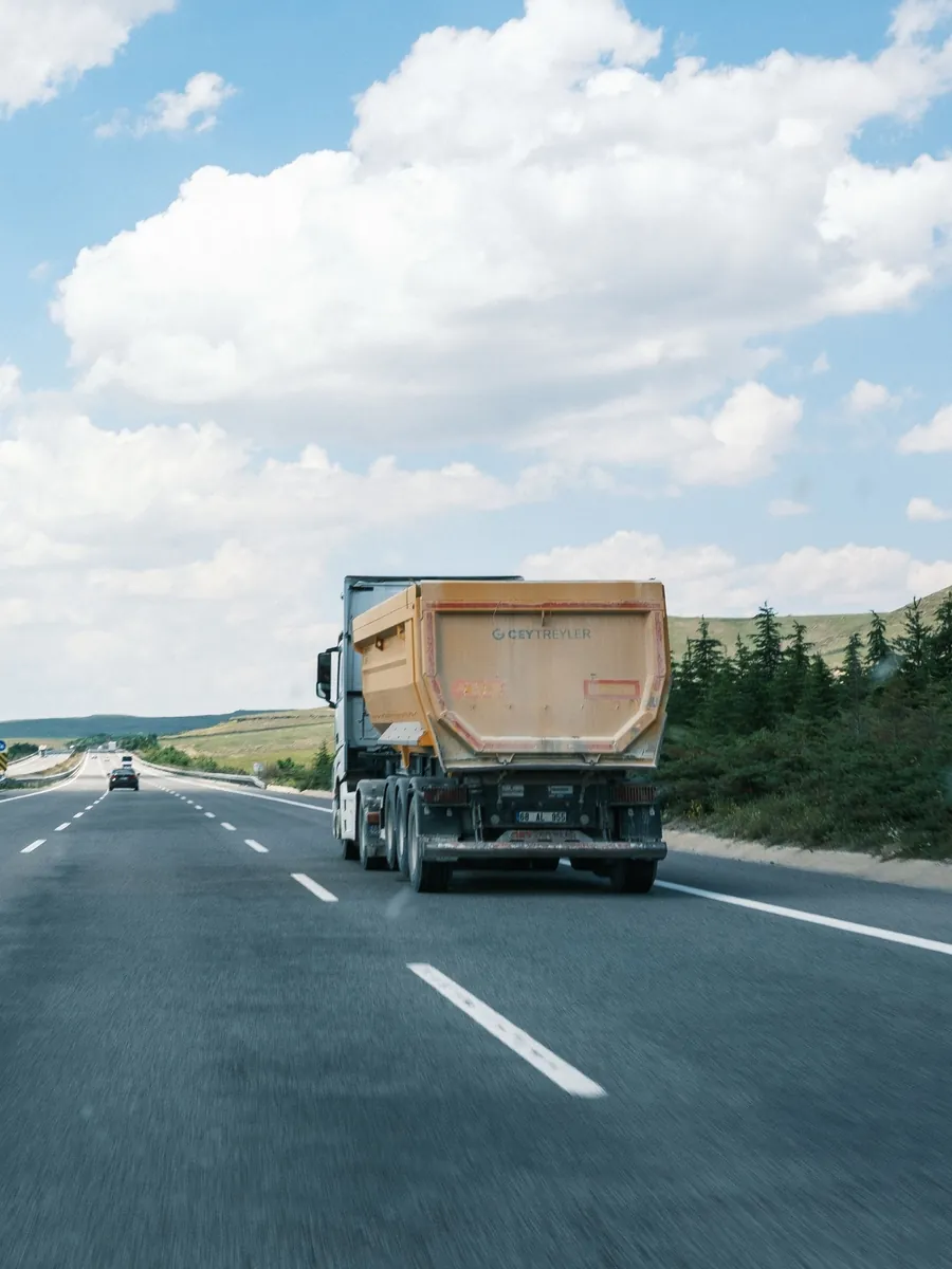 A tipper truck travelling along an open highway