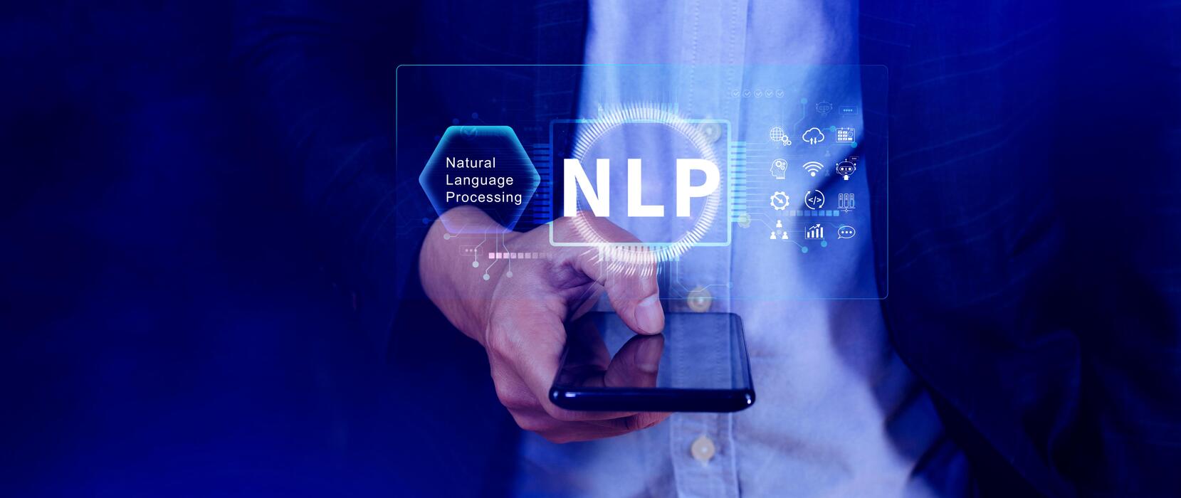 A hand holding a phone with an NLP interface projected above it, surrounded by icons for chat, search, analytics, and translation