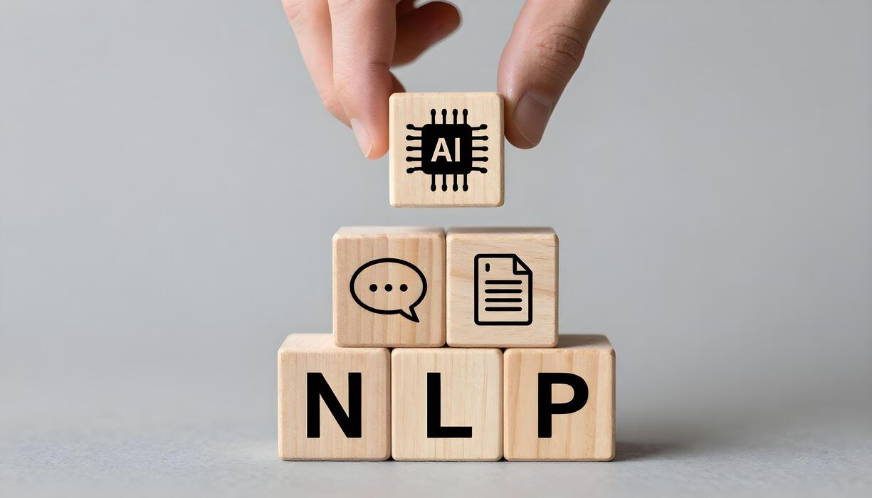 Wooden blocks spelling NLP, stacked under blocks for chat and documents with an AI chip placed on top