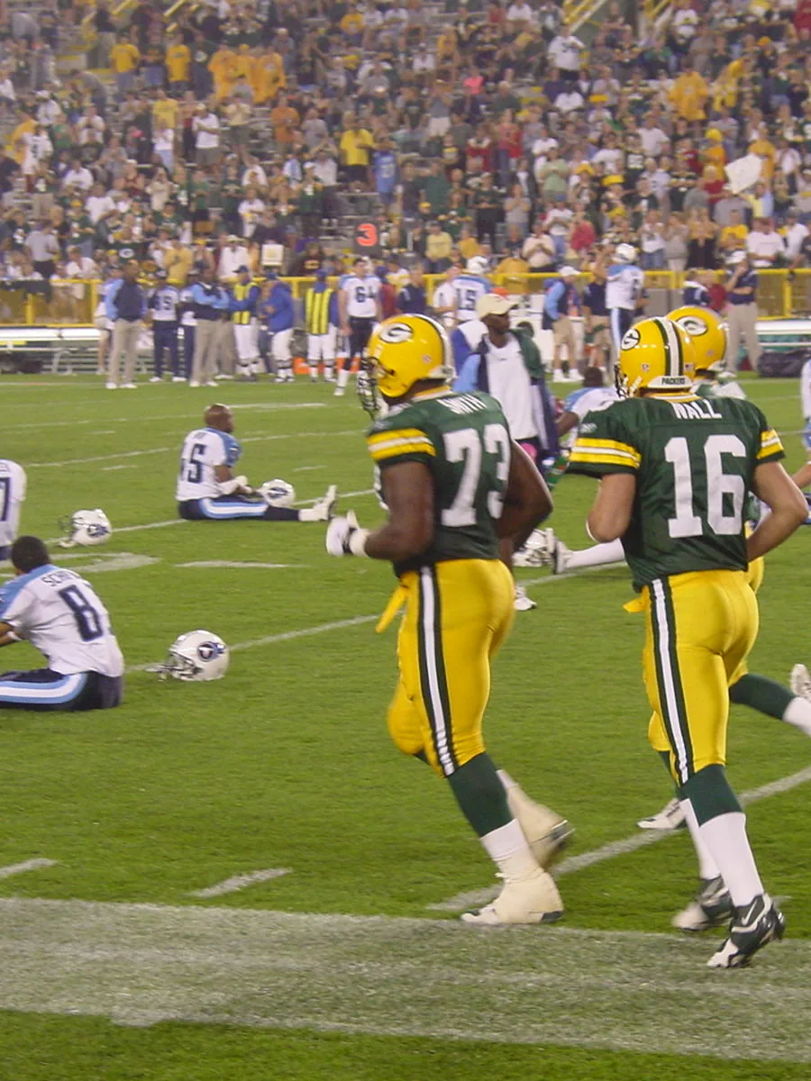 An American football player in helmet and pads