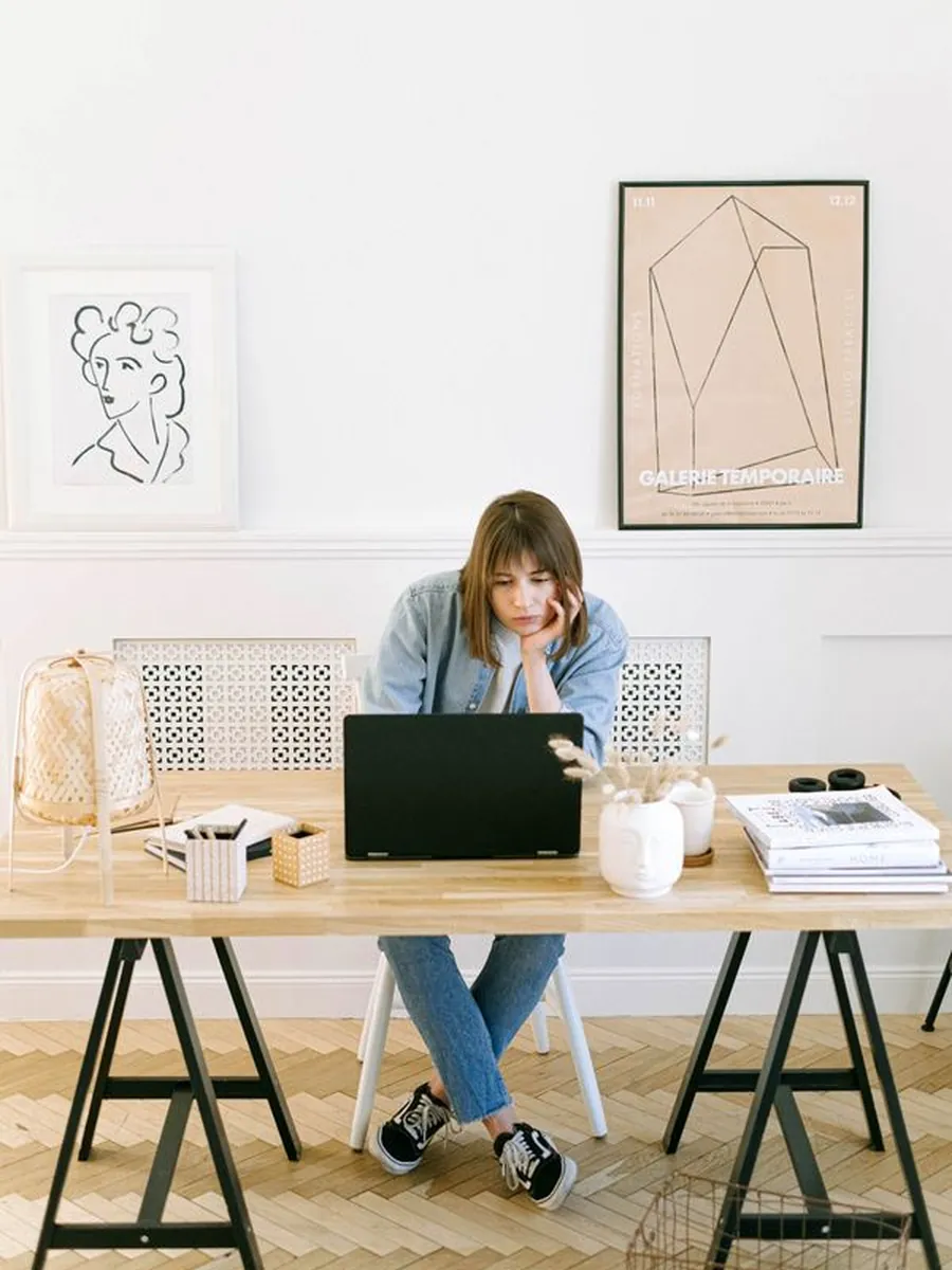 A marketer building an email campaign at a desk