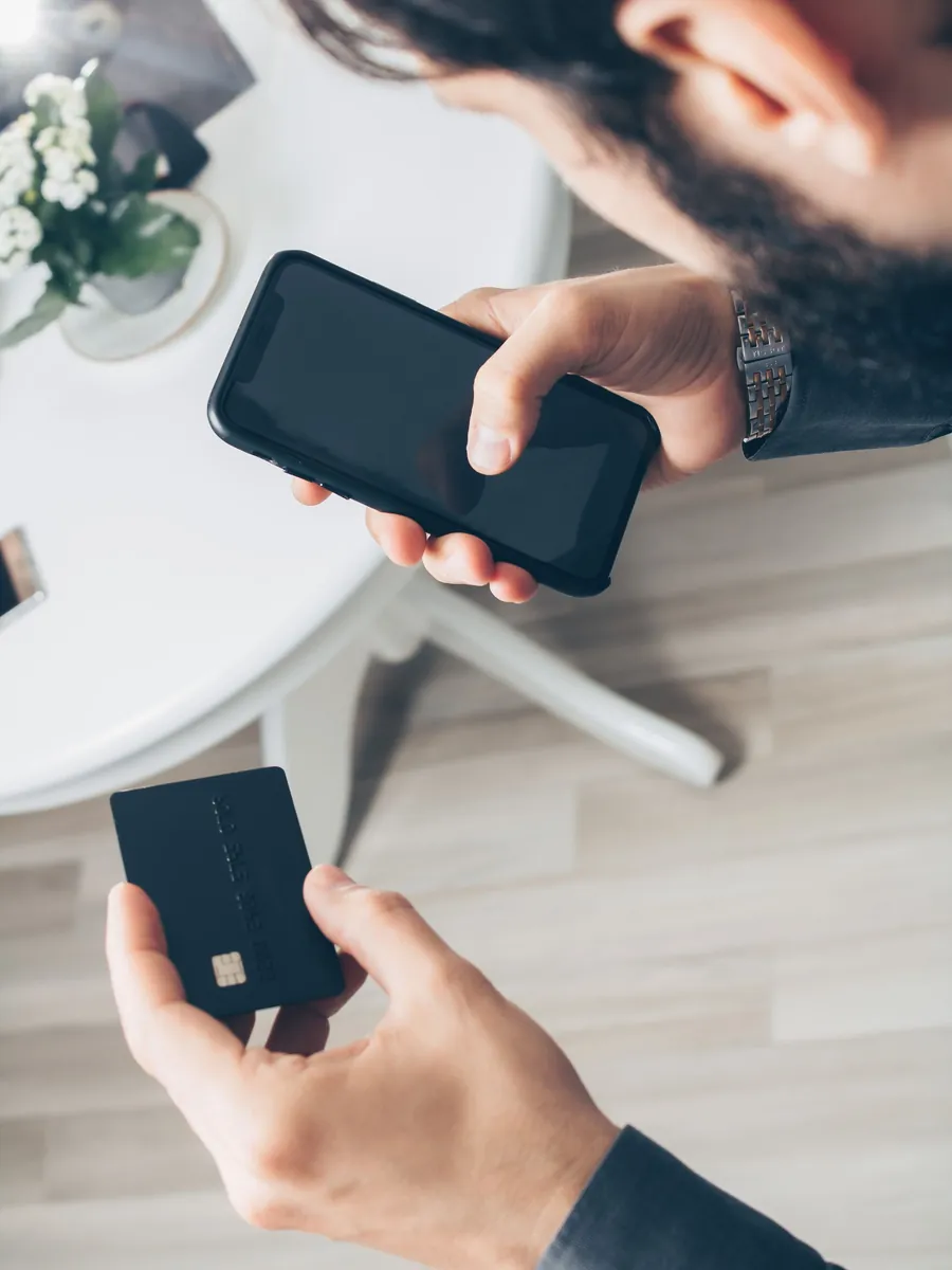 A customer completing a payment on a smartphone