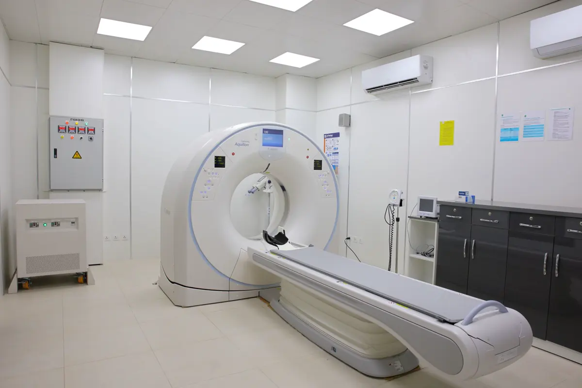 A CT scanner in a sterile hospital imaging room