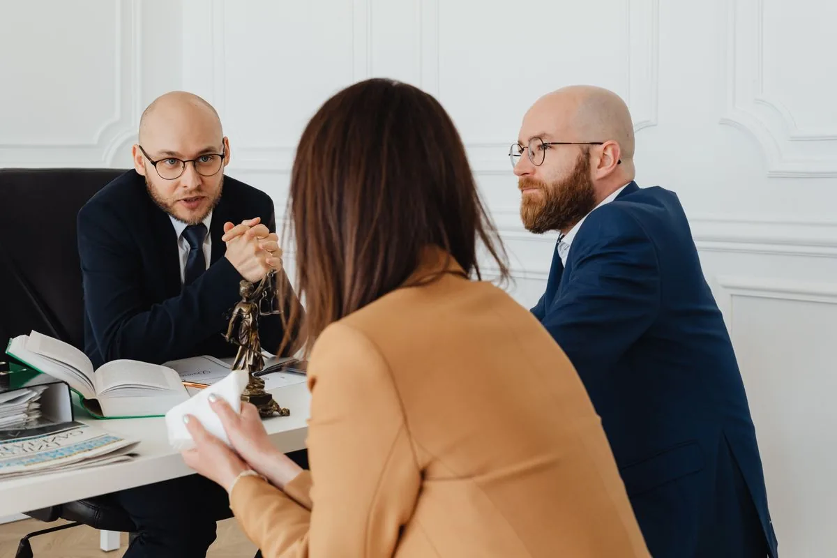 A lawyer talking a client through their options