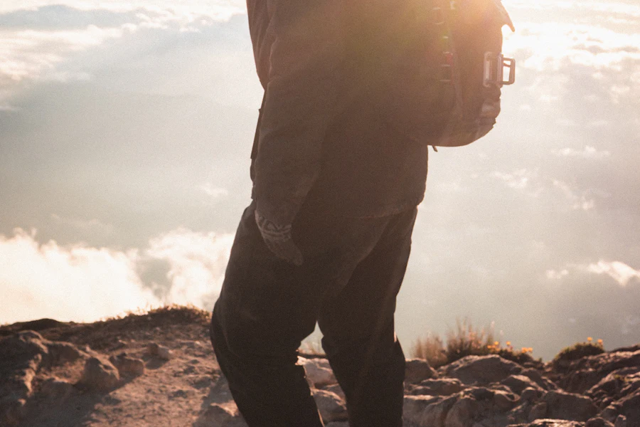A climber pushing for the summit at first light